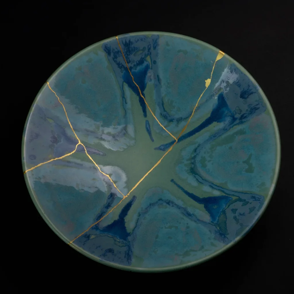 Blue bowl with gold finishing