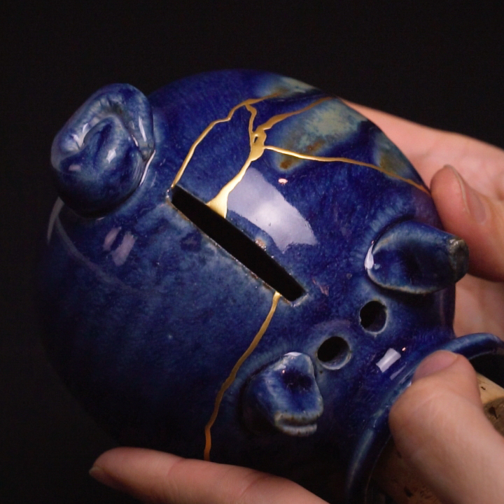 kintsugi repaired piggy bank